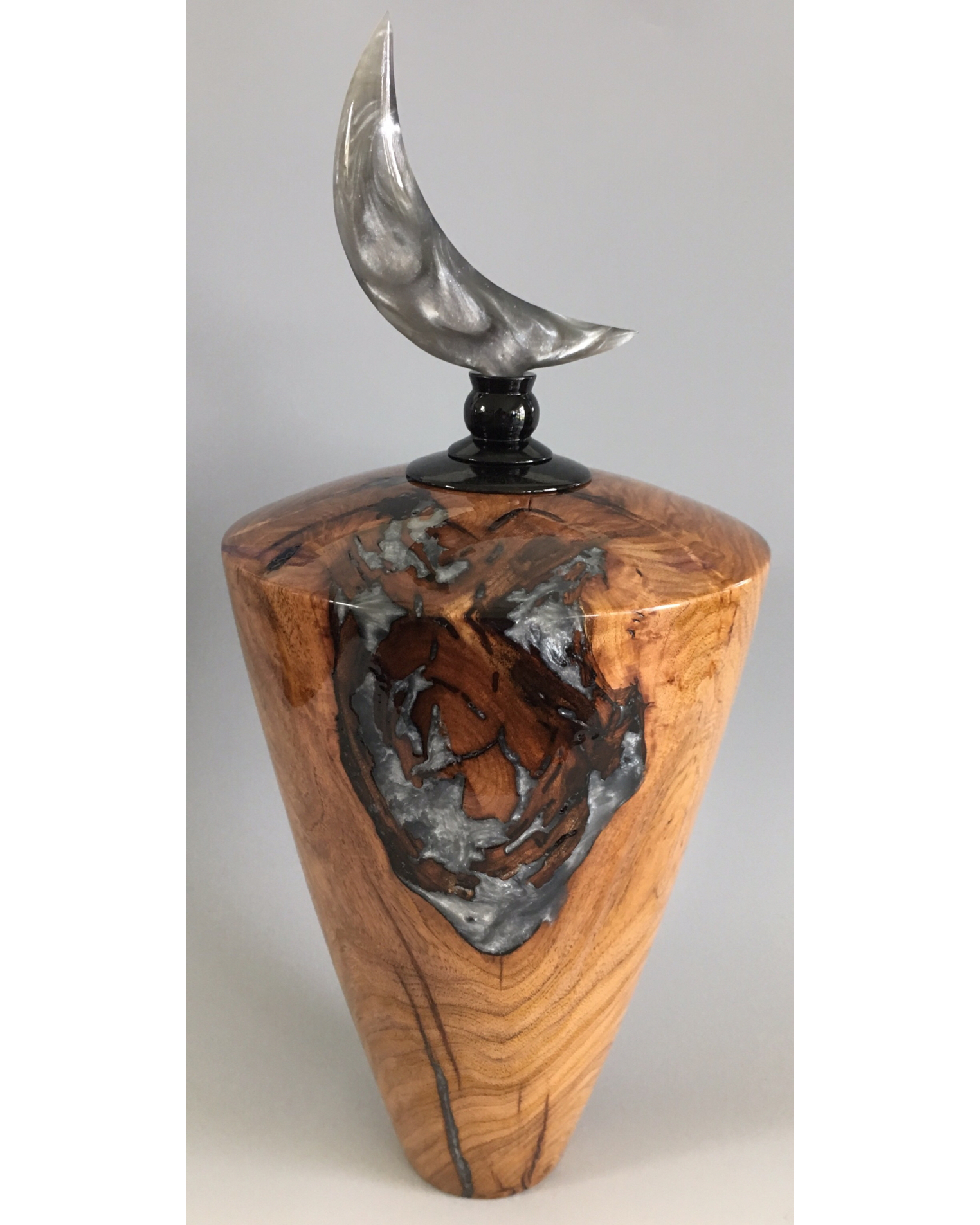 Mesquite hollow vessel with colored resin inlay and crescent moon finial