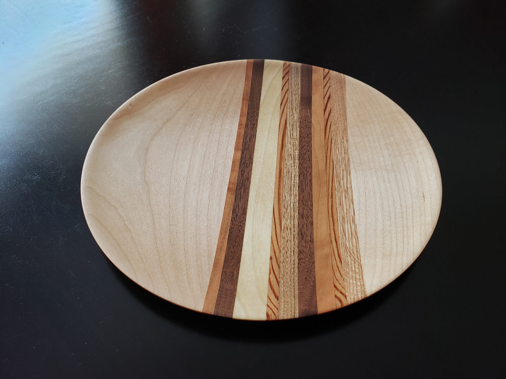 A wooden plate made from shop scraps