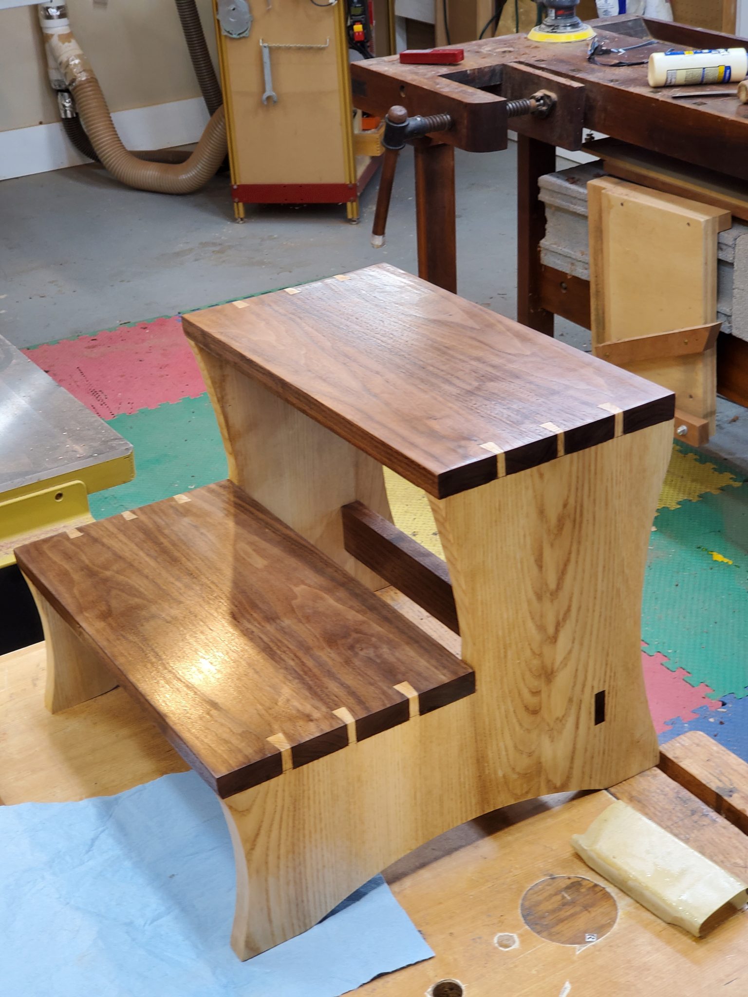 Walnut and ash step stool with hand cut dovetails