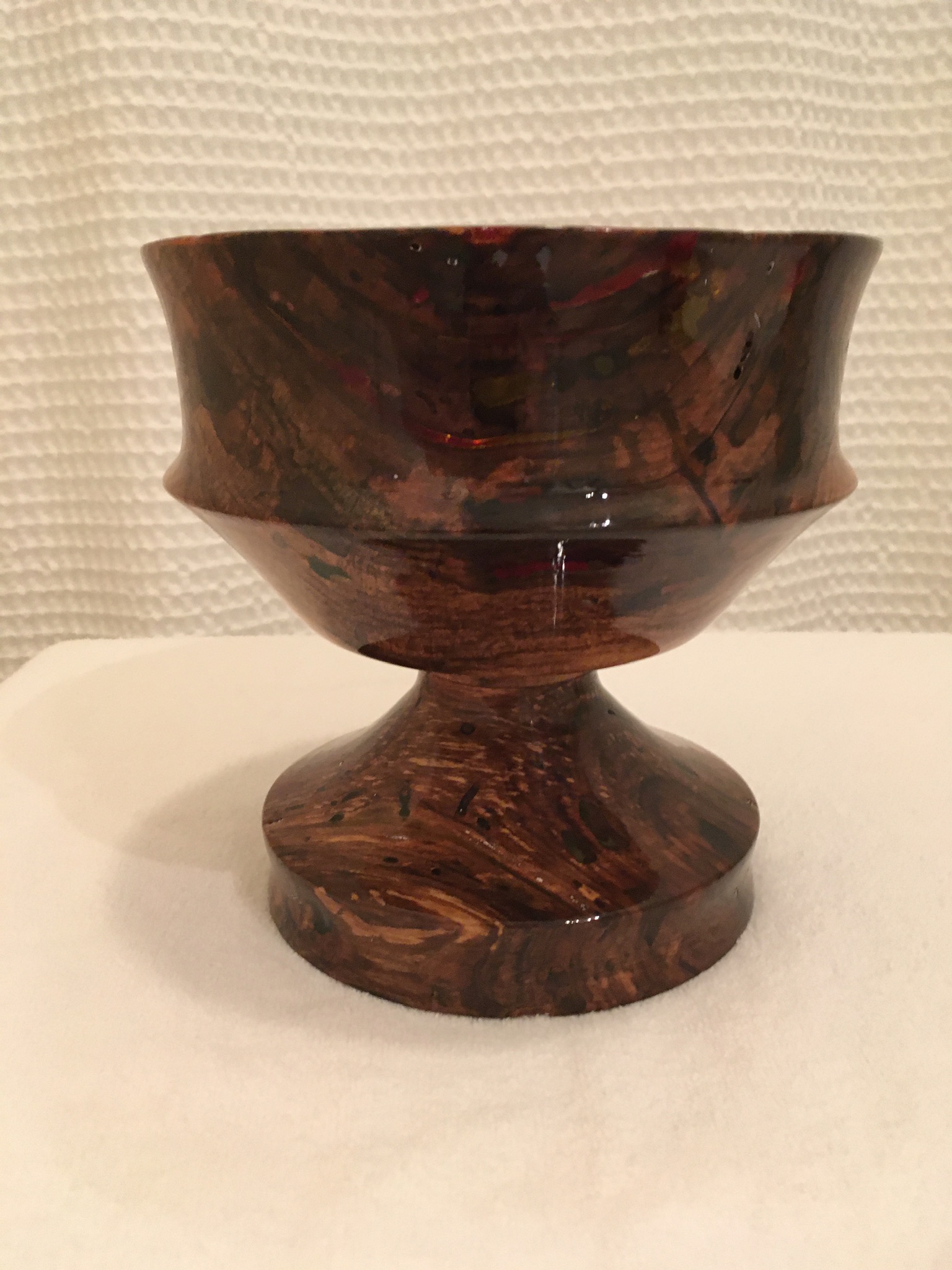 English walnut with worm holes filled with dyed epoxy and turned