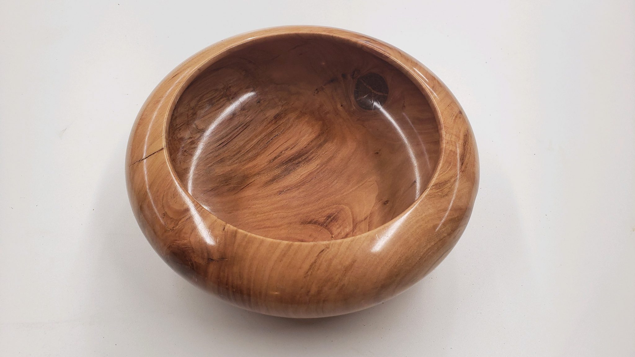 Multiple functional bowls in cherry, pear, and unknown.
