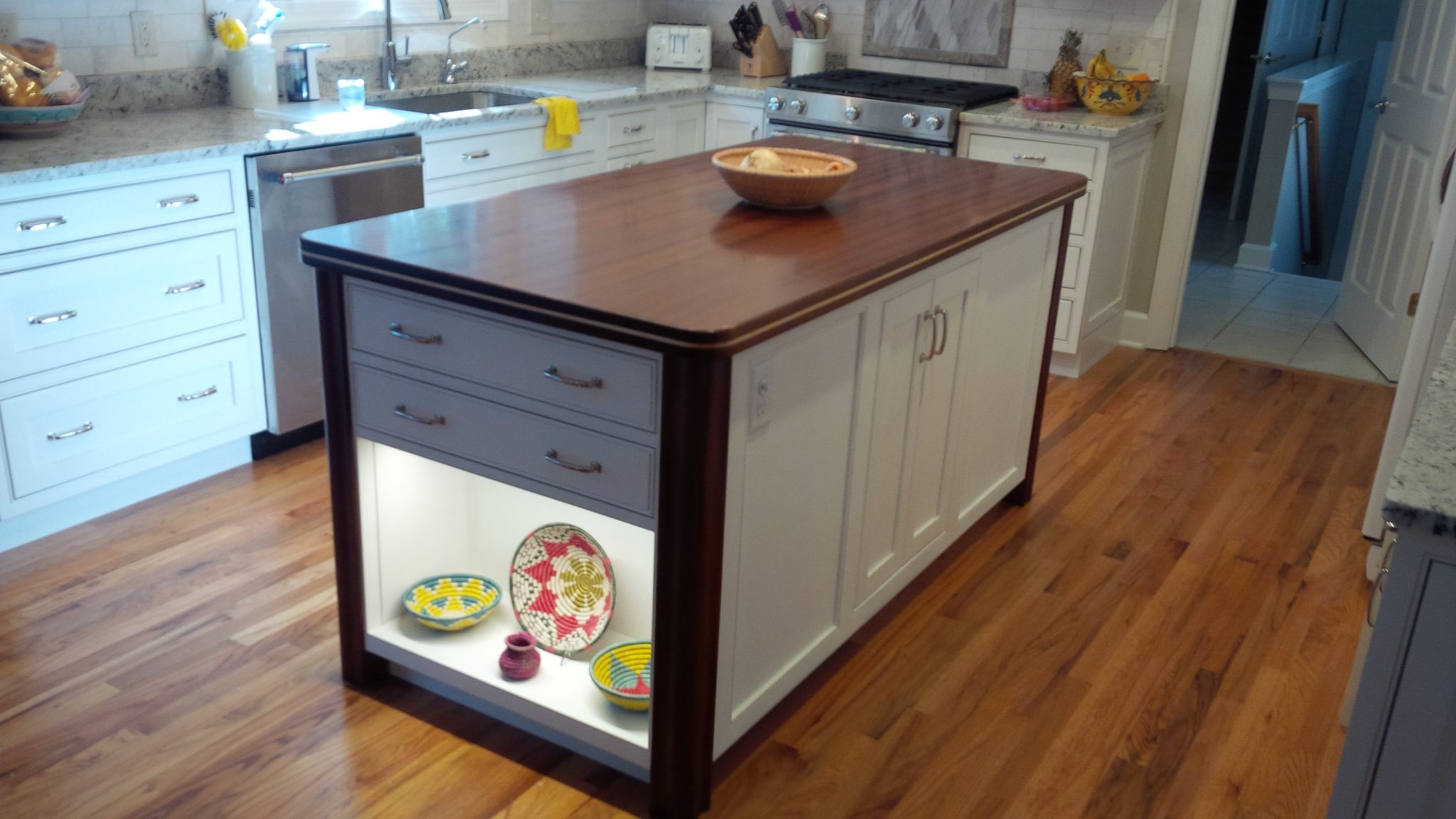 Kitchen Island (7' x 3') is constructed of a Sapele Top, Mahogany Legs and Plywood and Cherry Cabinetry