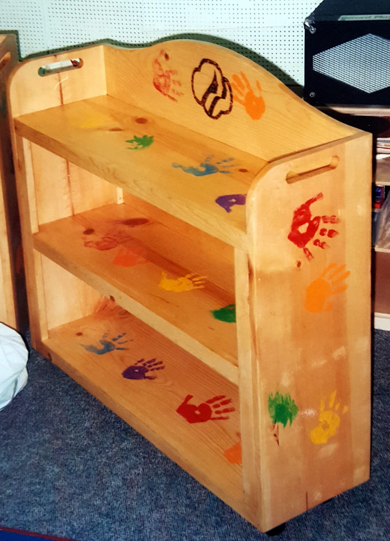 Simple shelf units for the storage of toys.  Made for The Center For Battered Women, Rochester NY. 
A project of the Henrietta Girl Scout Troup.  