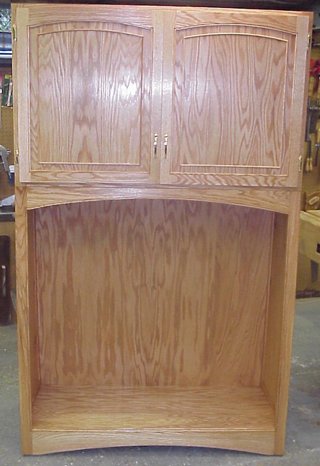 Oak Plywood cabinet designed to house rolls of plotter paper for the Strong Museum, Rochester NY.  The cabinet was designed using faux raised panels.