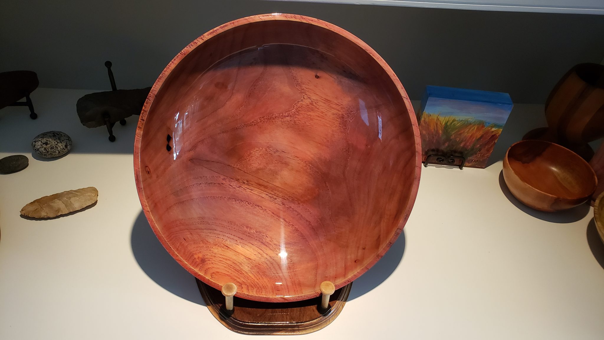 Pecan dyed blue, sanded back, epoxy dyed red, then poly