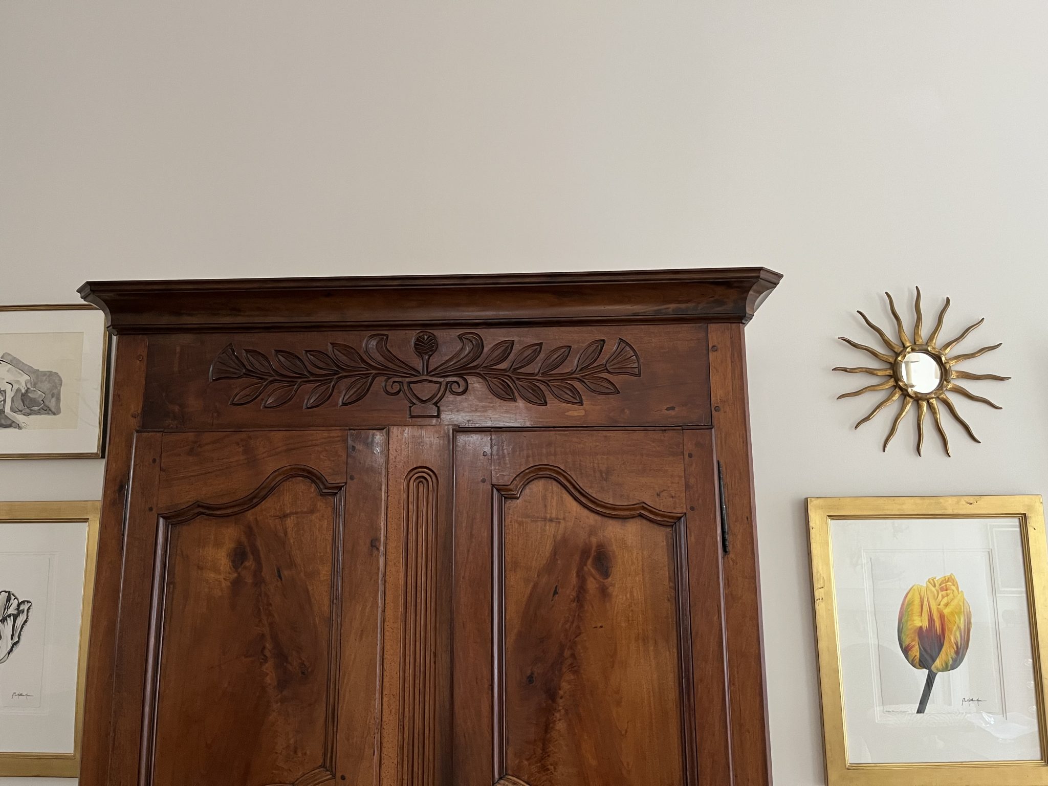 Replacement cornice for antique armoire.  
Material -cherry   3 piece custom crown   
Finish- bleached wood, Lockwood stain (walnut/English brown mahogany),thinned amber shellac, semi gloss lacquer.
