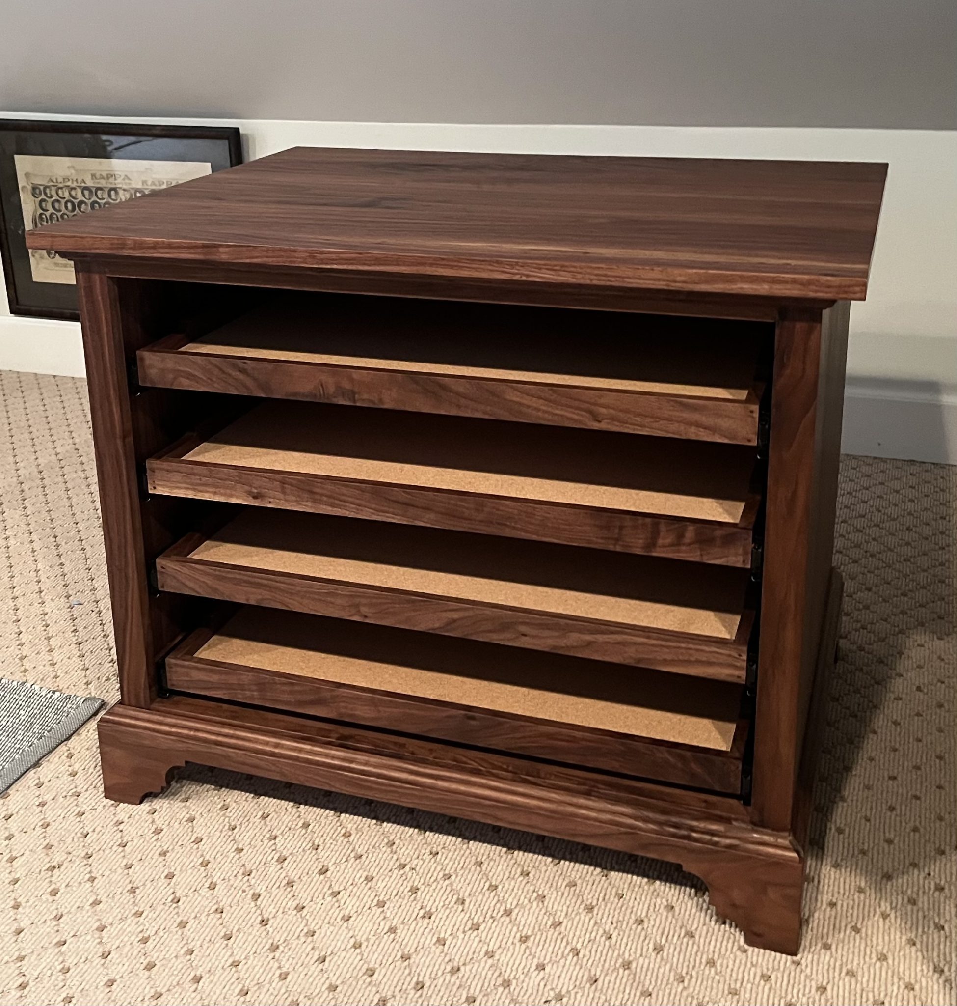 Black Walnut display cabinet with full extension cork lined trays on decorative base, with Osmo finish